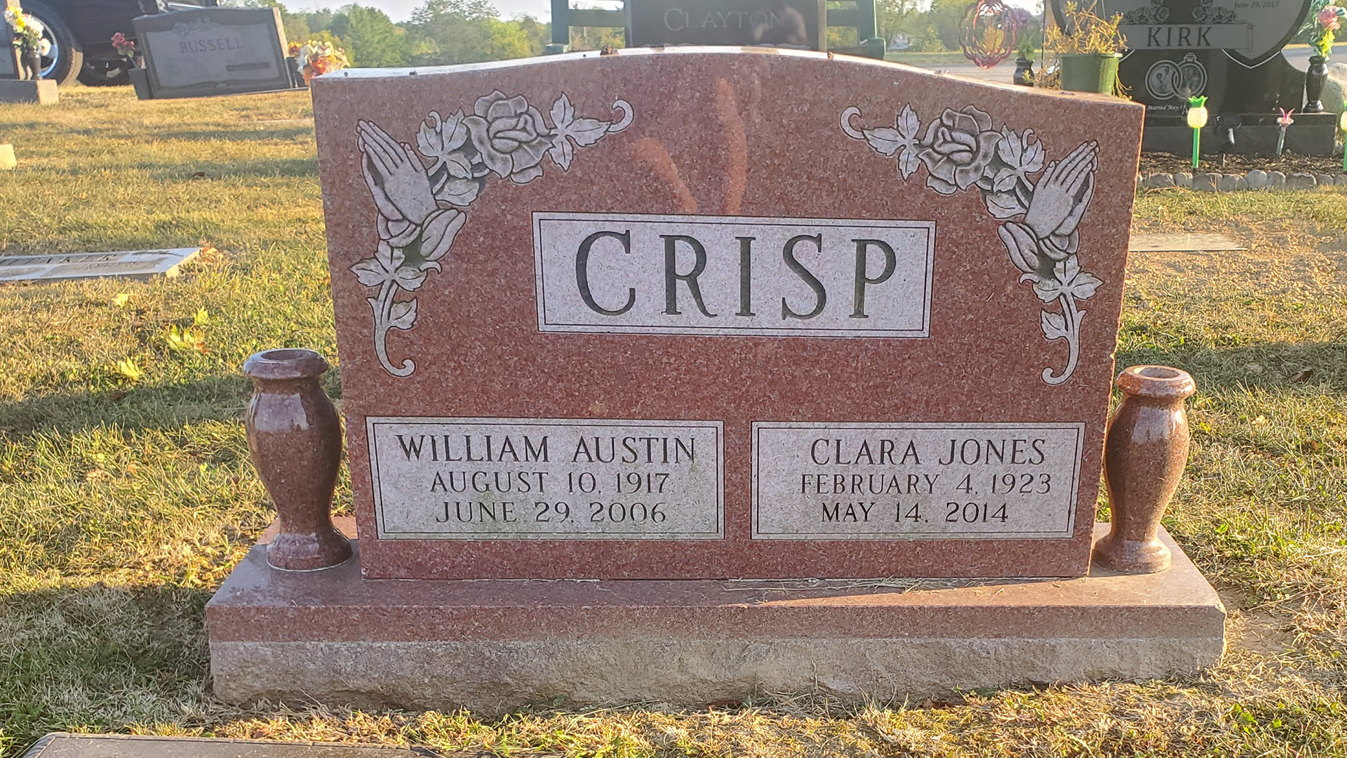 Red upright headstone Crisp